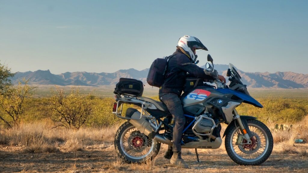 Sterling Noren riding BMW GS motorcycle in Buenos Aires National Wildlife Refuge 2020