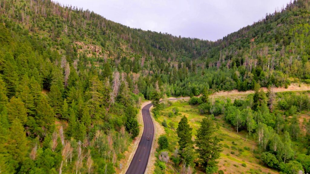 Sterling Noren riding BMW GS motorcycle Douglas Pass Colorado