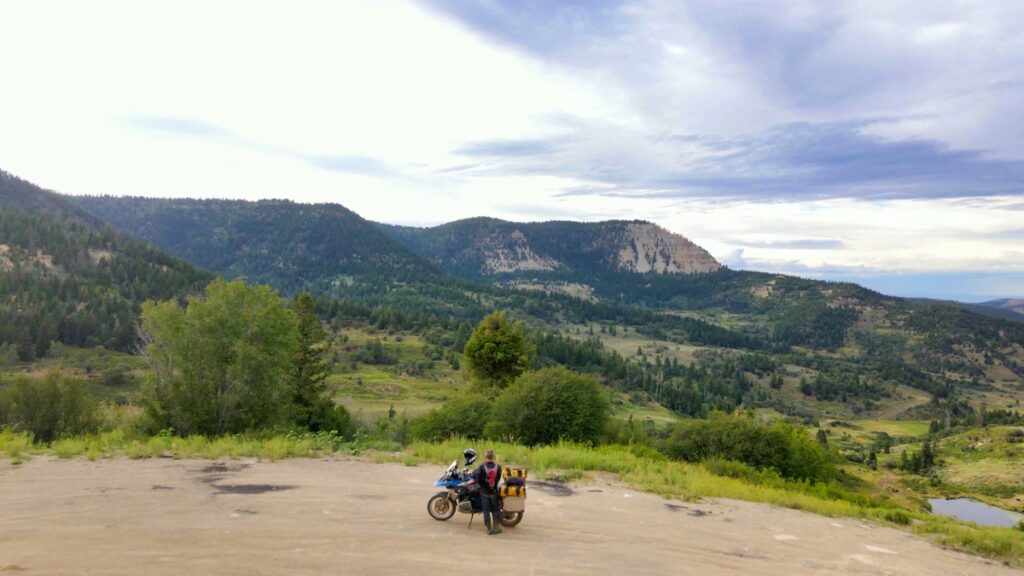 Sterling Noren riding BMW GS motorcycle Douglas Pass Colorado