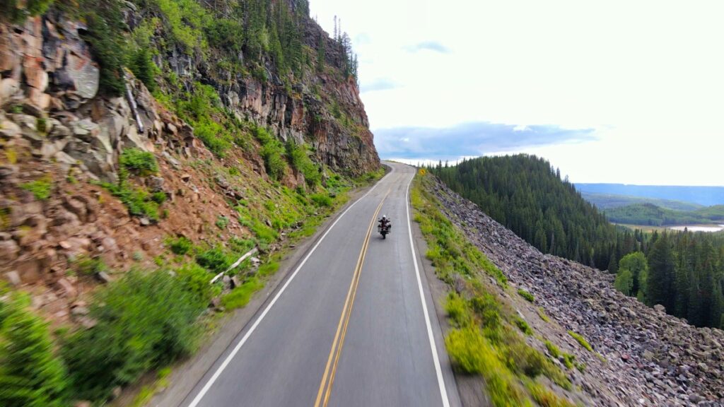 Sterling Noren riding BMW GS motorcycle Douglas Pass Colorado